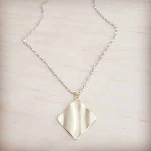 **Gilded Wave Pendant Necklace 257mb
