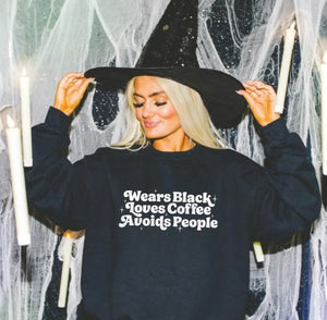 Wears black
