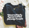 Wears black