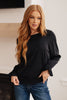 Peaceful Moments Smocked Sleeve Blouse in Black